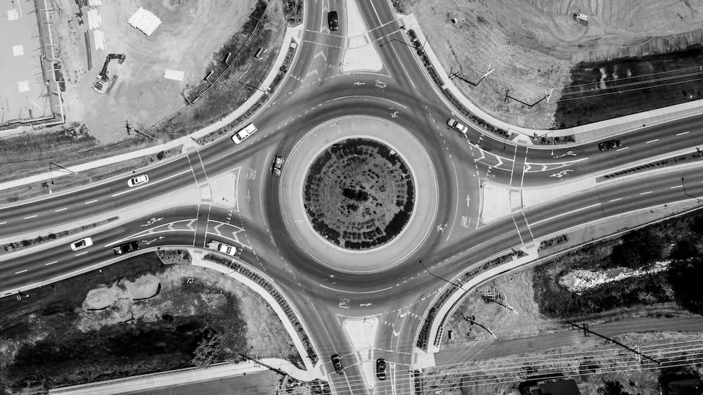 Cars on a roundabout.